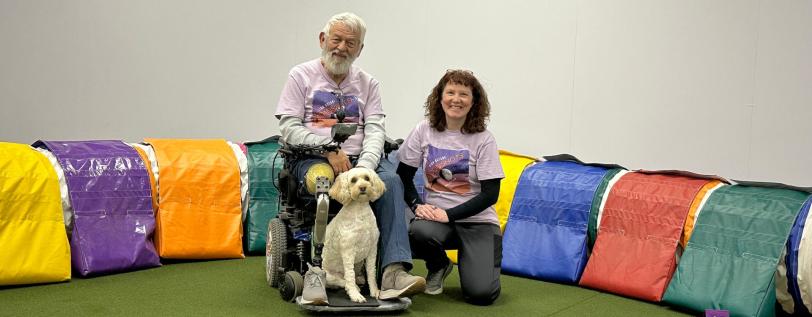 Ron Godshall and agility dog “Franco” next to Heather Eckenrode-Stiffler.