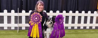 2025 Westminster Masters Obedience champion, Willie, with his owner after winning.